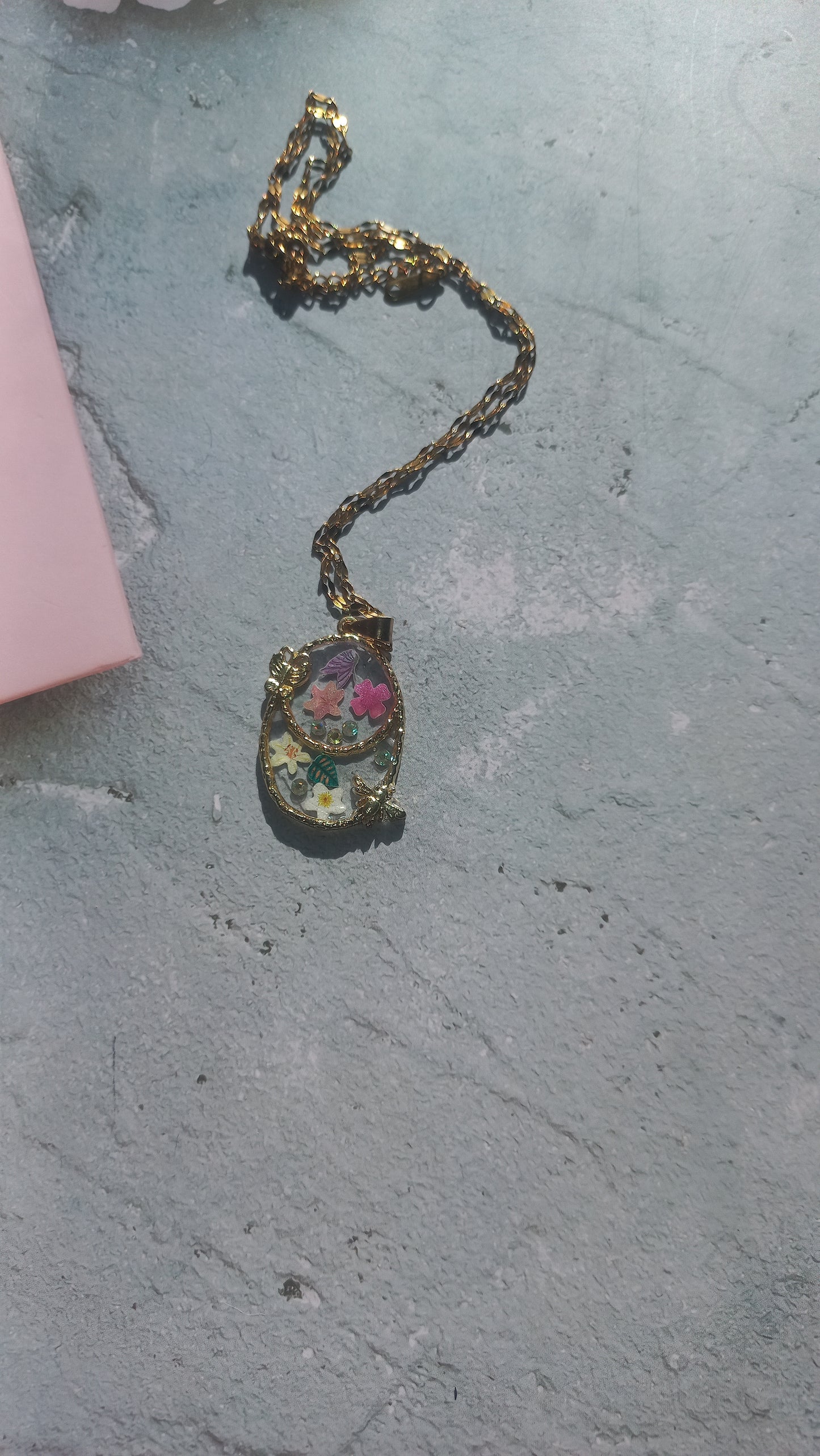 Flowers in resin gold pendant