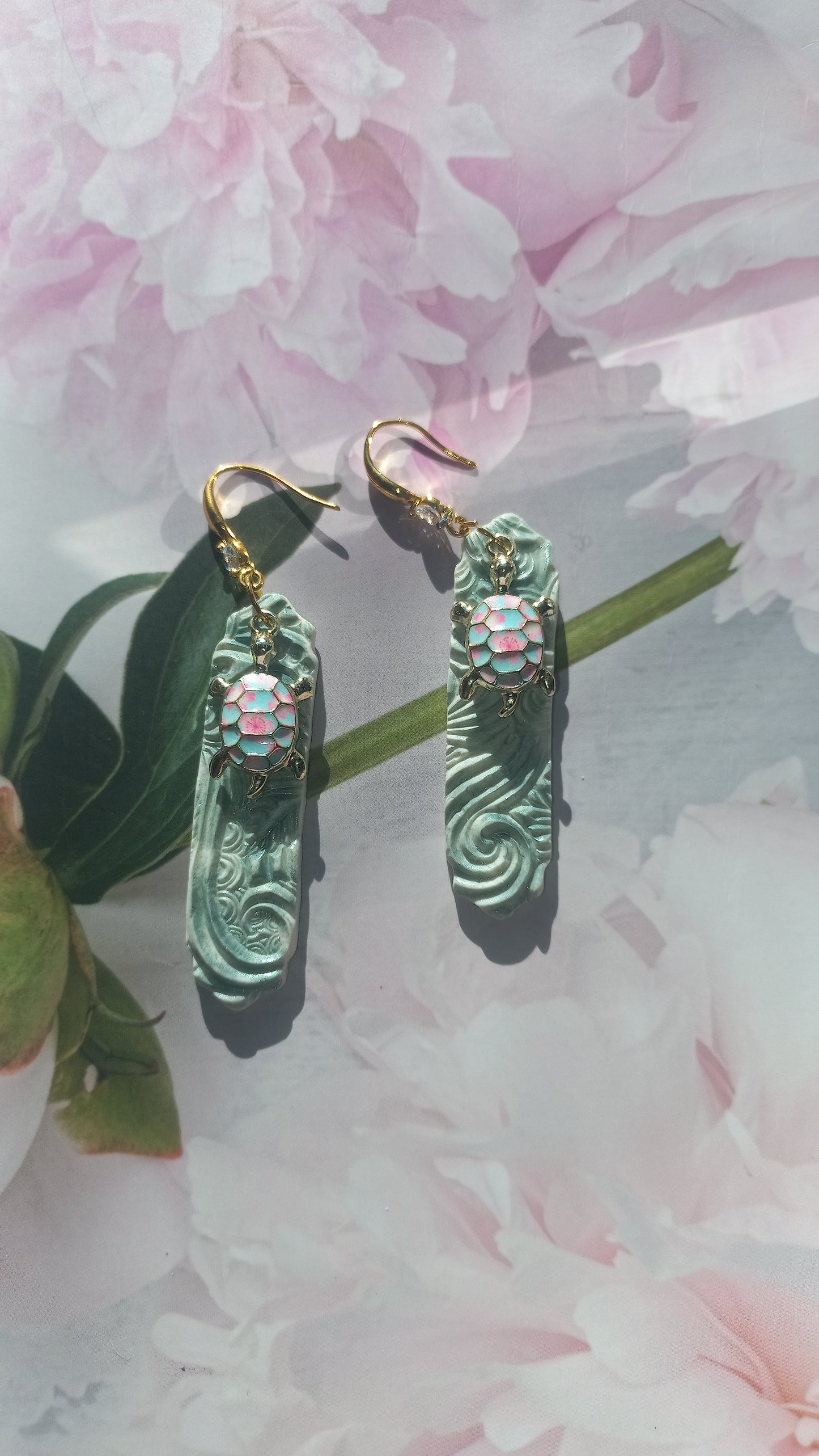 Olive green polymer clay earrings with pink and blue tortiose