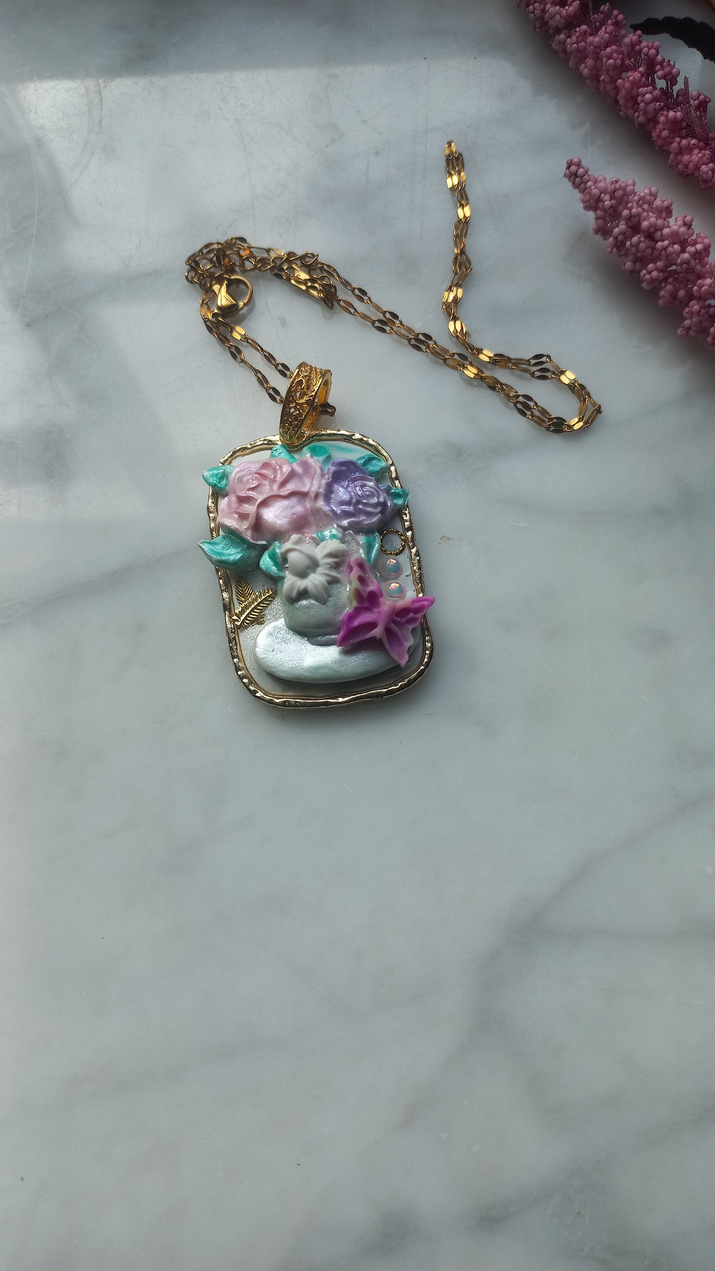 Polymer clay flower pendant