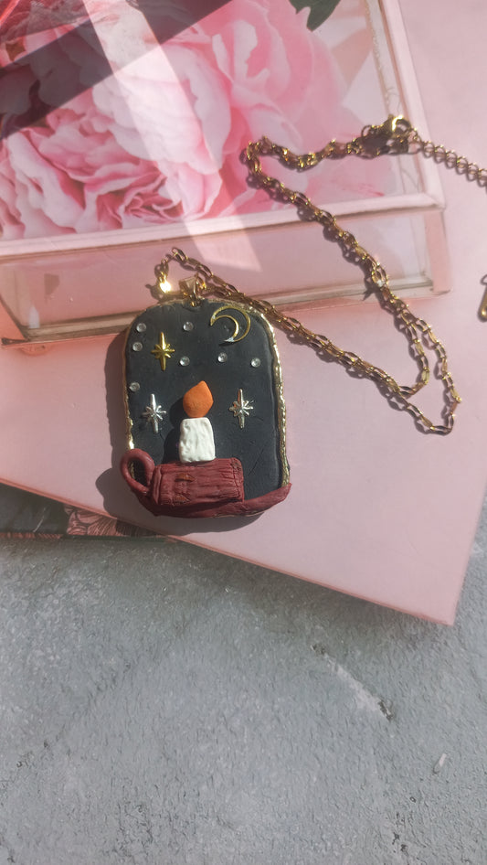 Midnight polymer clay candle in window pendant