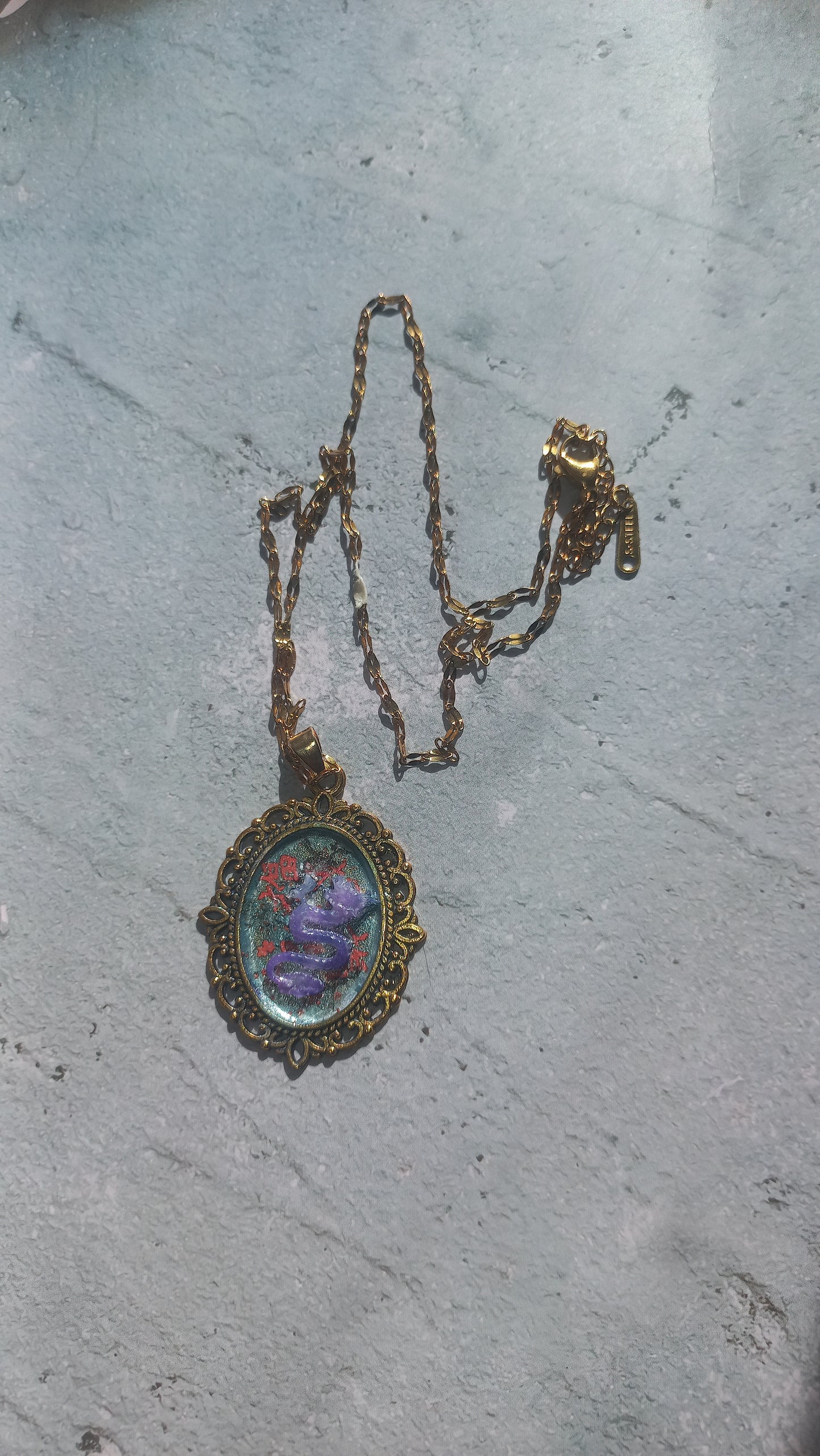 Vintage Asian themed brass colour pendants