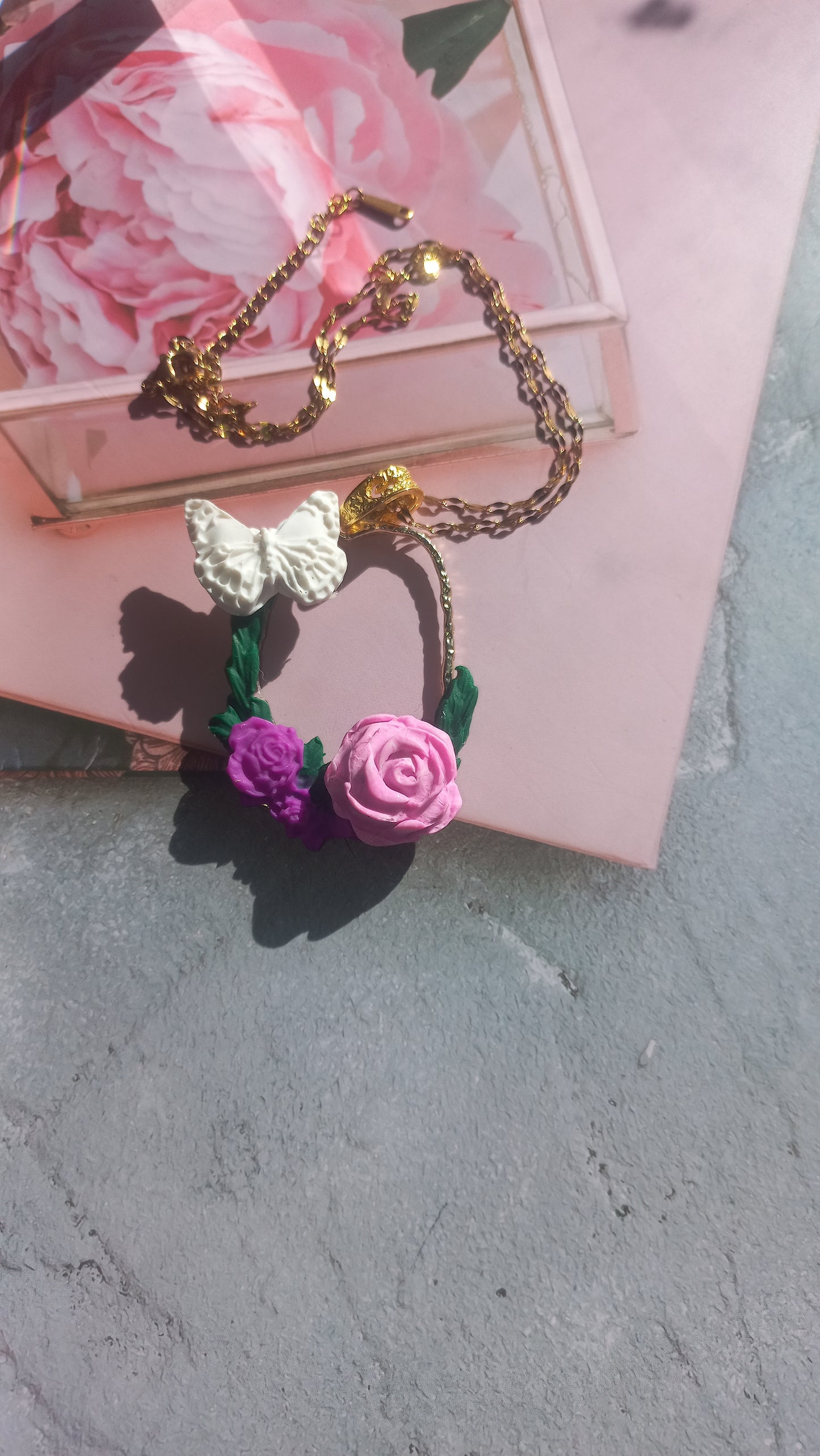 White butterfly with pink rose polymer clay pendant