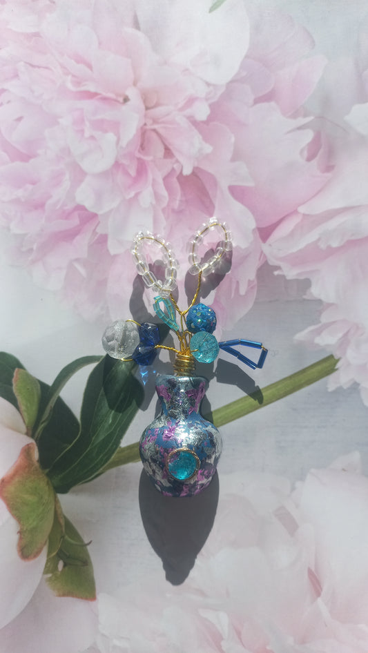 Silver and blue foil vase brooch