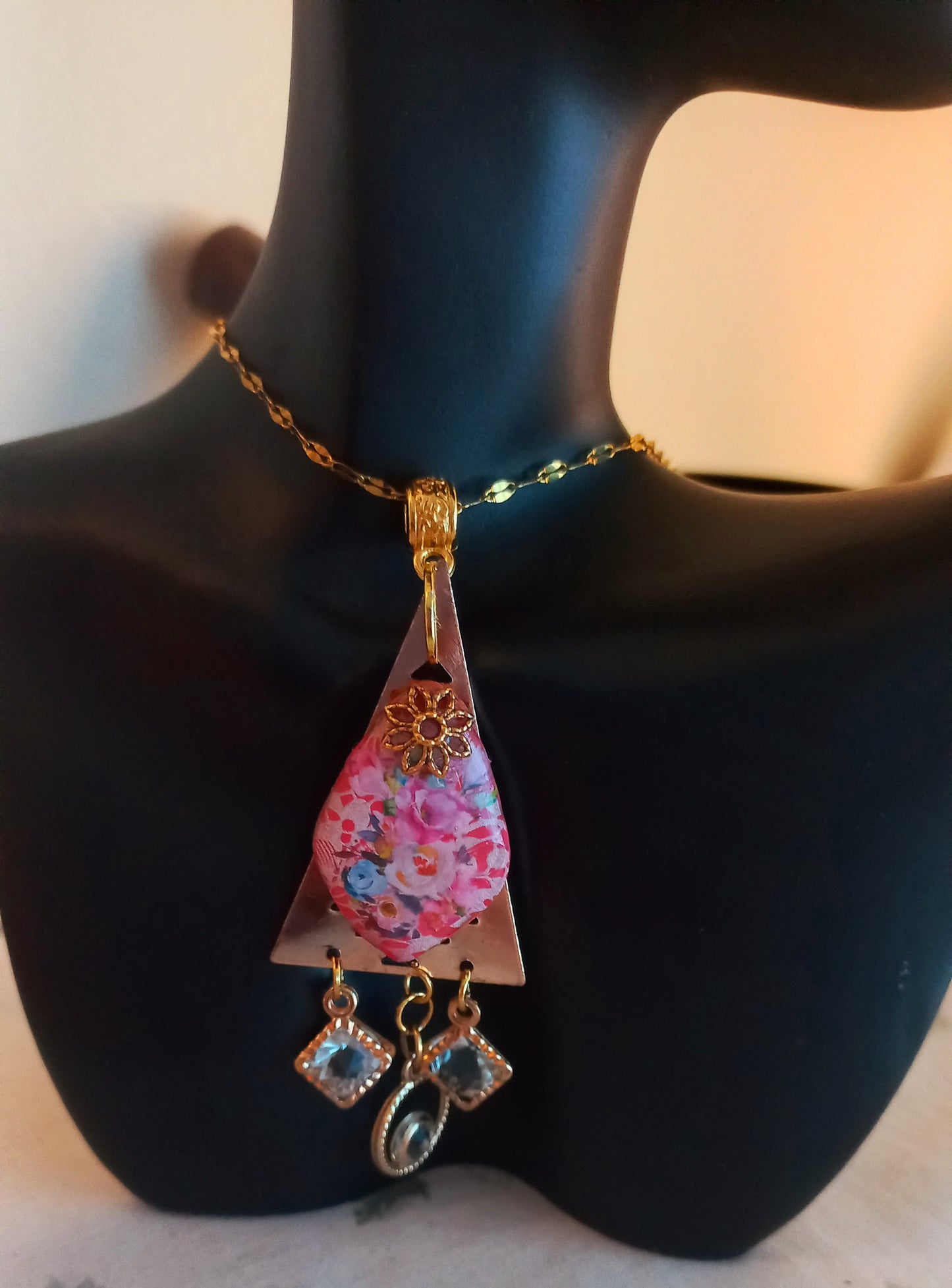Polymer clay lace silkscreen floral pendant with gold plated chain.
