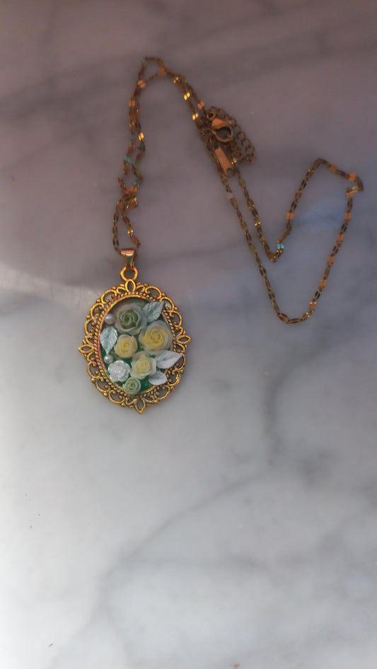 Hues of green and yellow flowers  polymer clay resin pendant