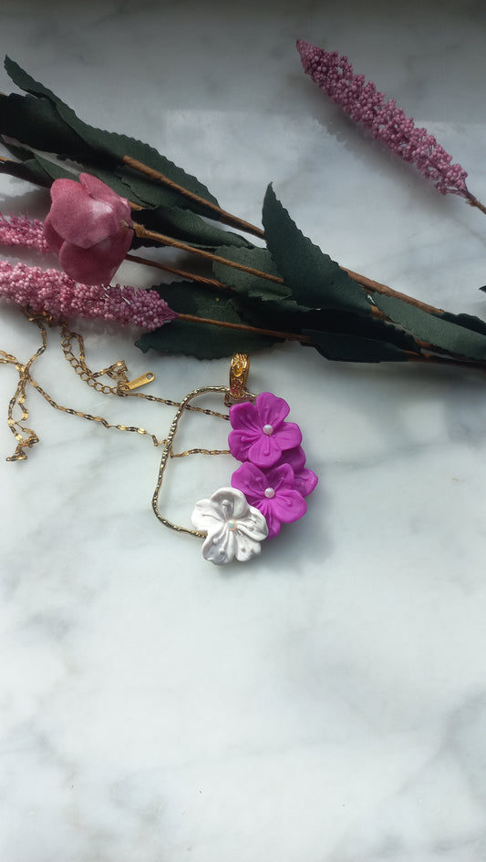 Purple & white tropical flower pendant