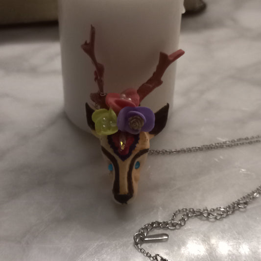 Polymer clay gazelle pendant