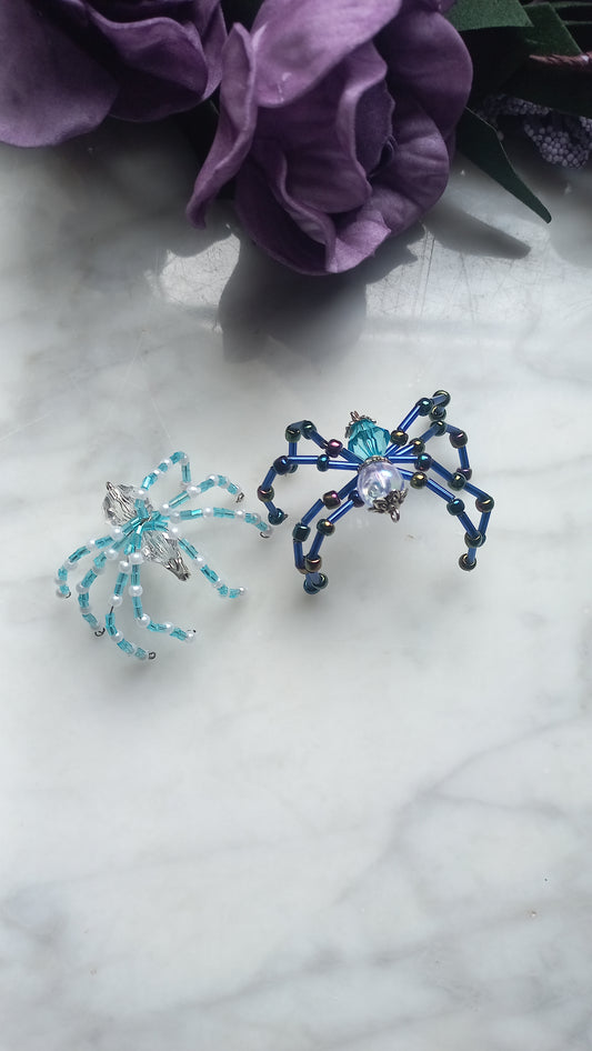 Beaded spider brooches