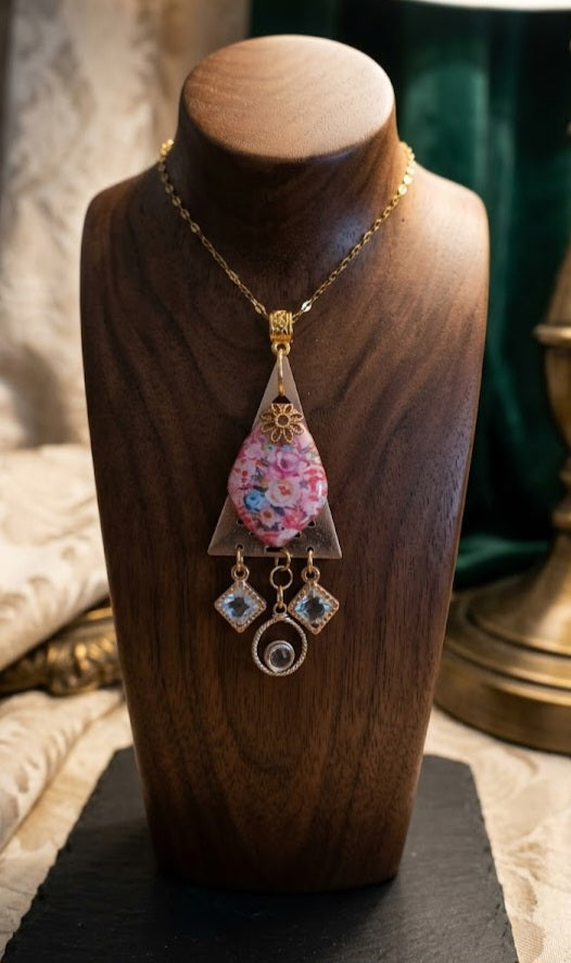 Polymer clay lace silkscreen floral pendant with gold plated chain.